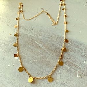 Long gold necklace